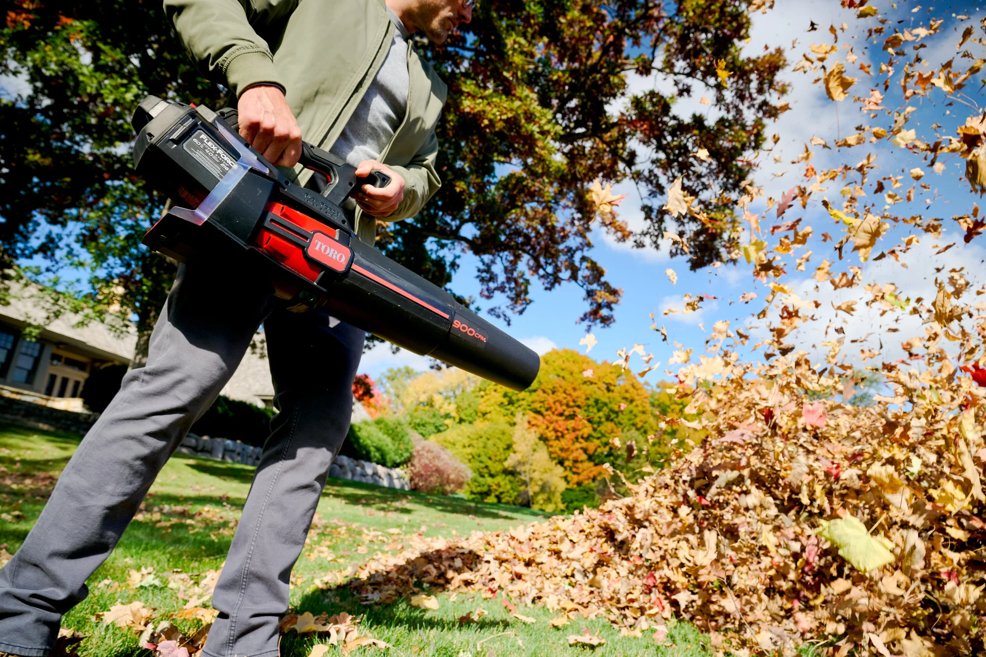 Toro 60V Max 900 Series Leaf Blower 51827 Blowing Leaf Pile product image