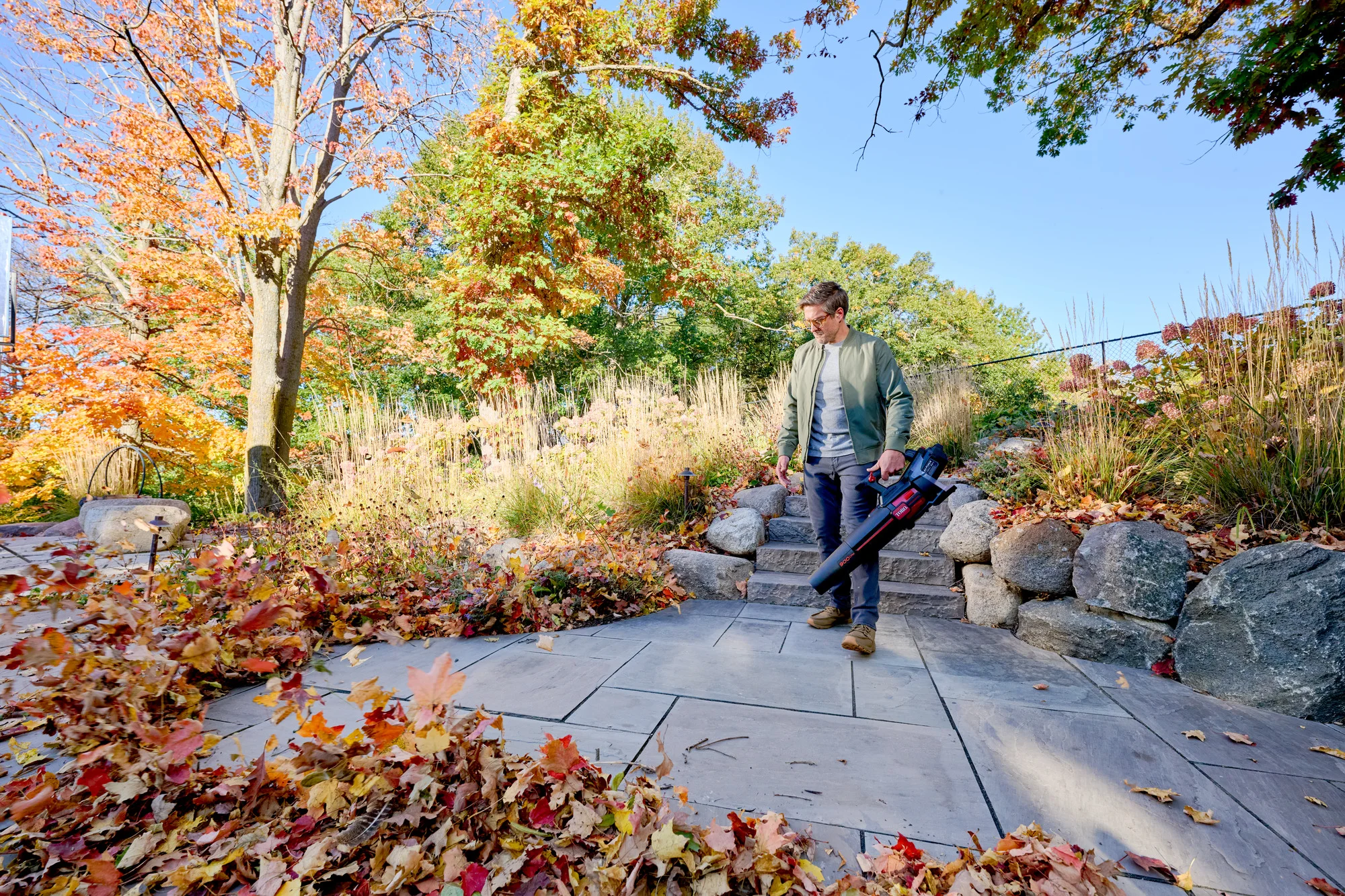 Toro 60V MAX Leaf Blower 51827 Toro 60V Max 900 Series Leaf Blower 51827 Stone Patio Leaf Cleanup product image