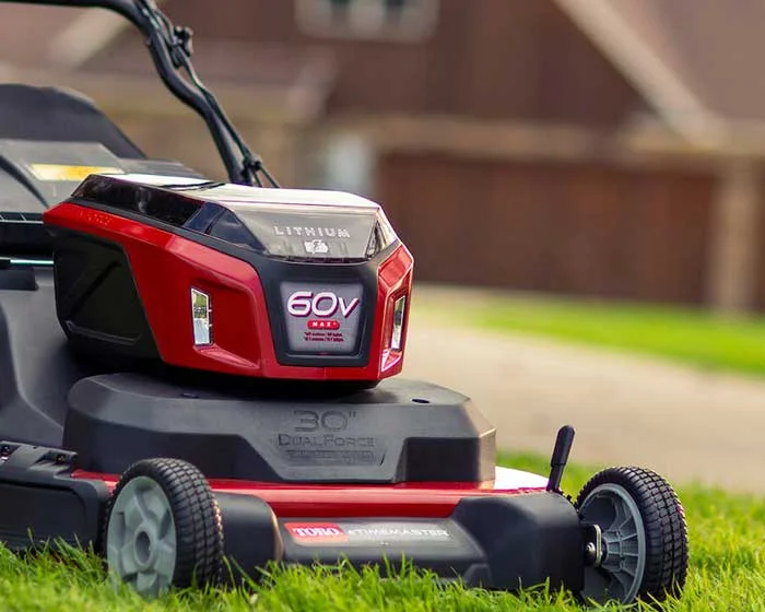 Toro 60V MAX eTimeMaster Walk Behind Lawn Mower 21493 Toro 60v Max E Timemaster Series Walk Behind Lawn Mower 21493 Front View Left Closeup Battery