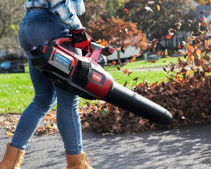 Toro 60V Max Leaf Blower 51822 Man Blowing Leaves product image