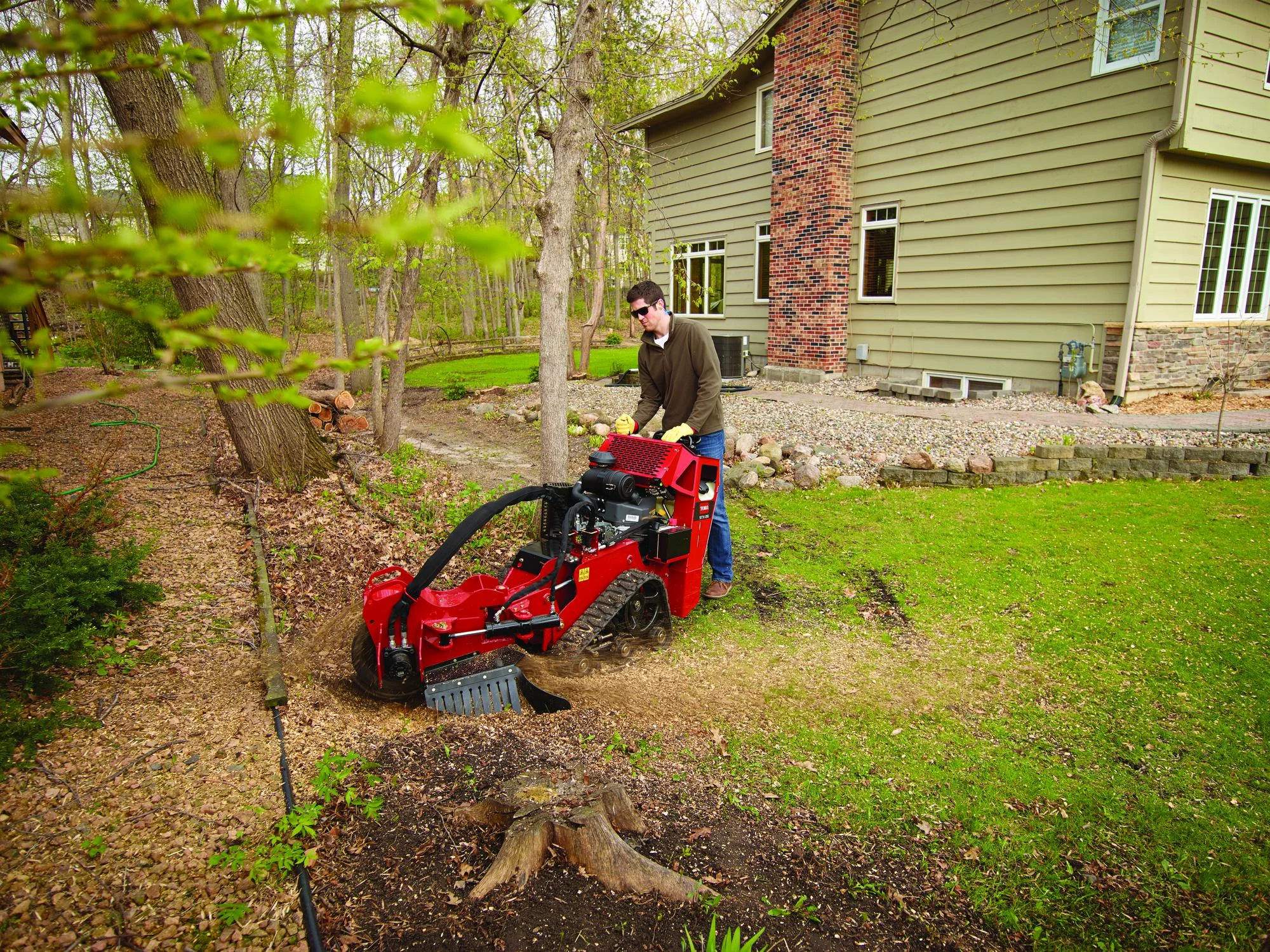 Toro Dingo Stump Grinder 22429 Man Clearing Stump House product image