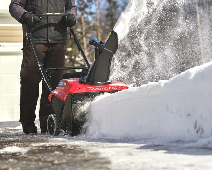 Toro Power Clear Series Single Stage Snow Blower 38752 Front View Left Clearing Driveway