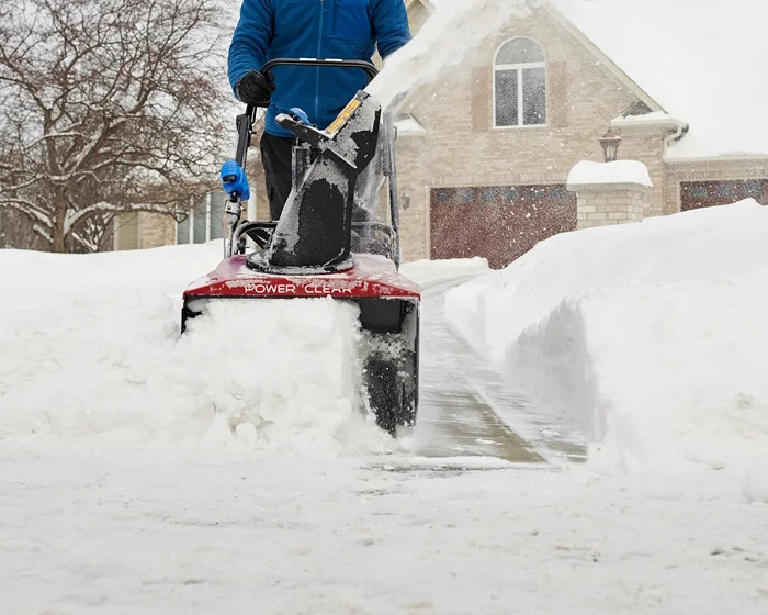 Toro Power Clear Series Single Stage Snow Blower 38755 Front View Clearing Driveway product image