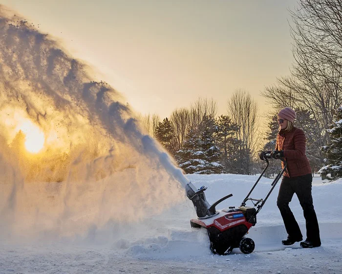 Toro Power Clear Series Single Stage Snow Blower 38755 Side View Right Clearing Sidewalk product image