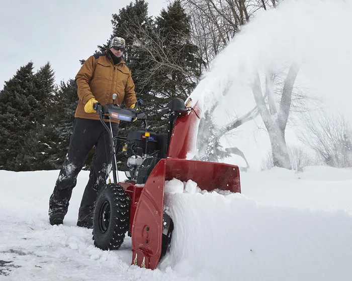 Toro Power Max Series Two Stage Snow Blower 37798 Front View Left Clearing Sidewalk product image