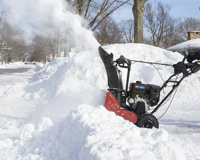 Toro Snowmaster Series Single Stage Snow Blower 36003 Side View Right Clearing Driveway product image
