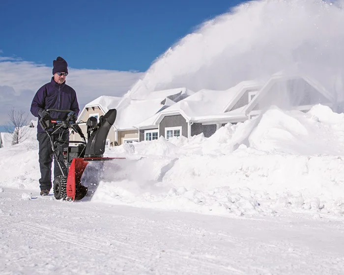Toro Snowmaster Series Two Stage Snow Blower 36002 Front View Left In Use Sidewalk product image