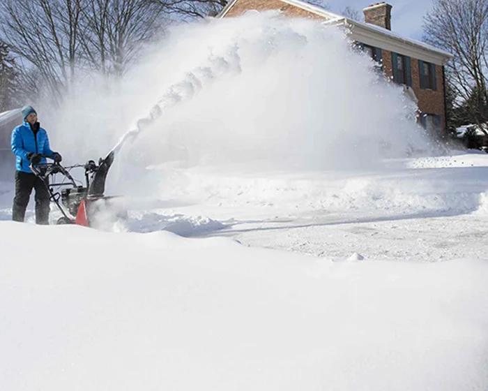 Toro Snowmaster Series Two Stage Snow Blower 36002 Front View Wide In Use Sidewalk product image