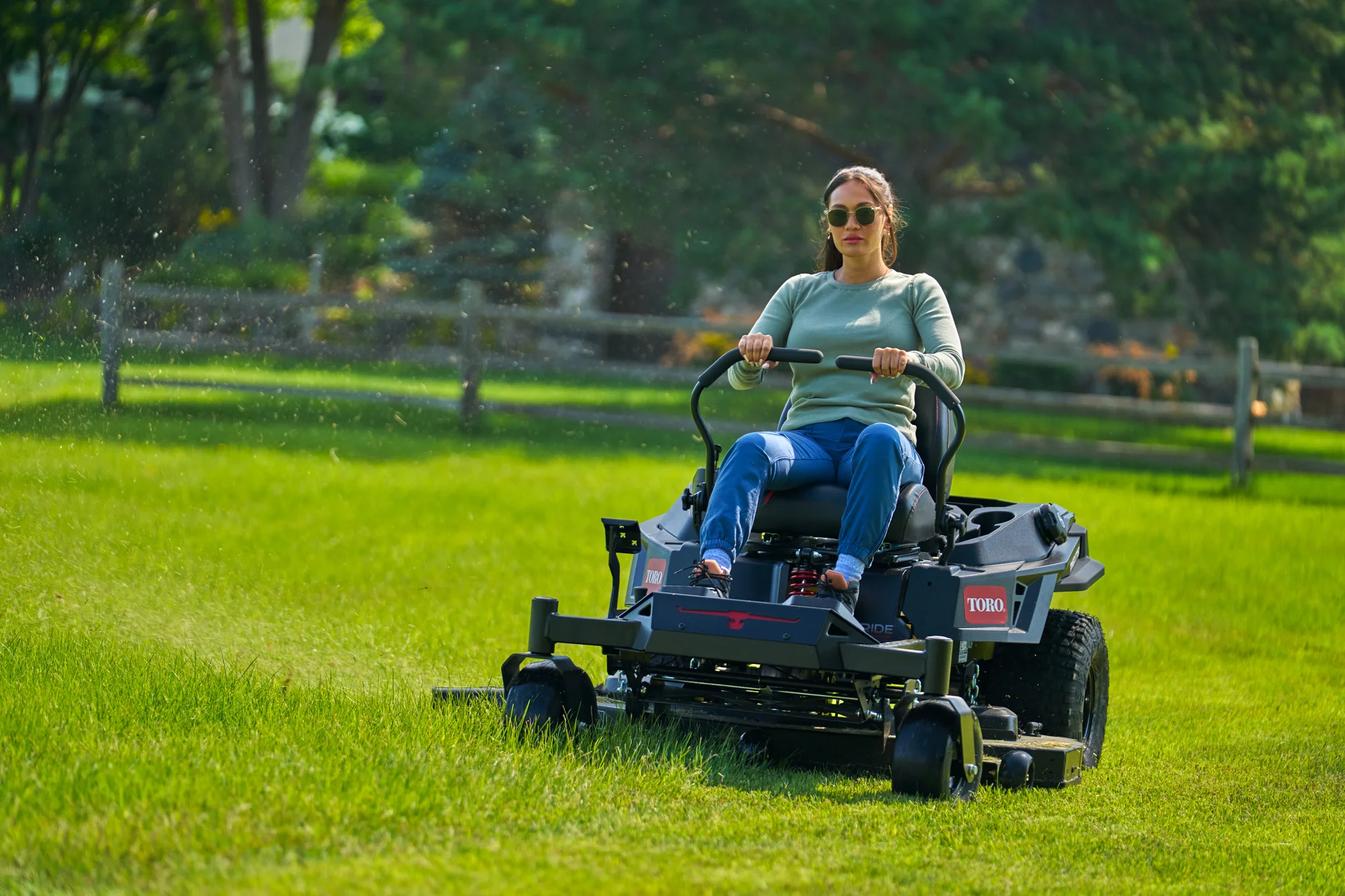 Toro Timecutter Max Havoc Myride Series Zero Turn Rider 77507 Woman Cutting Grass product image