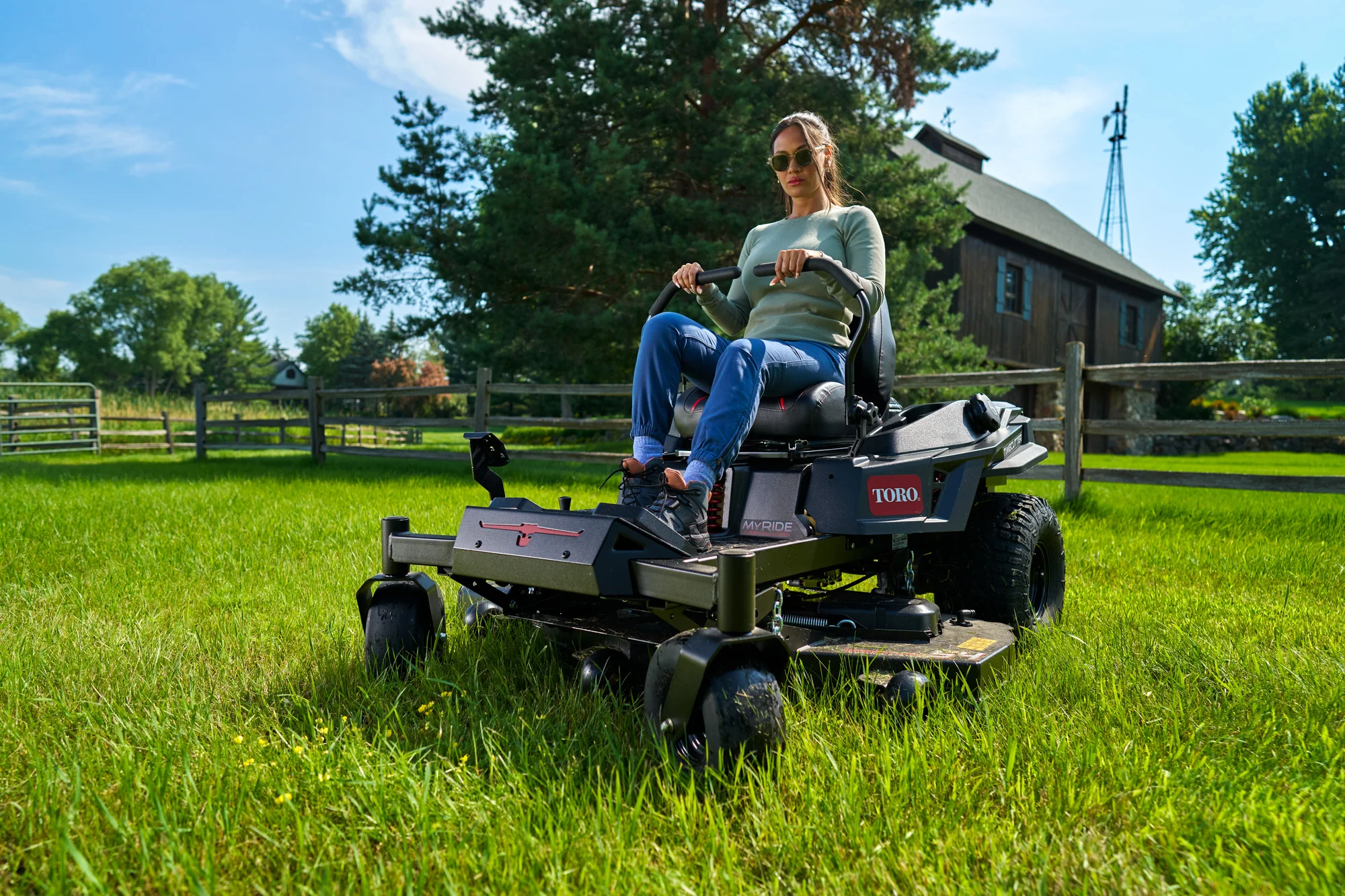Toro Timecutter Max Havoc Myride Series Zero Turn Rider 77507 Woman Mowing Tall Grass product image