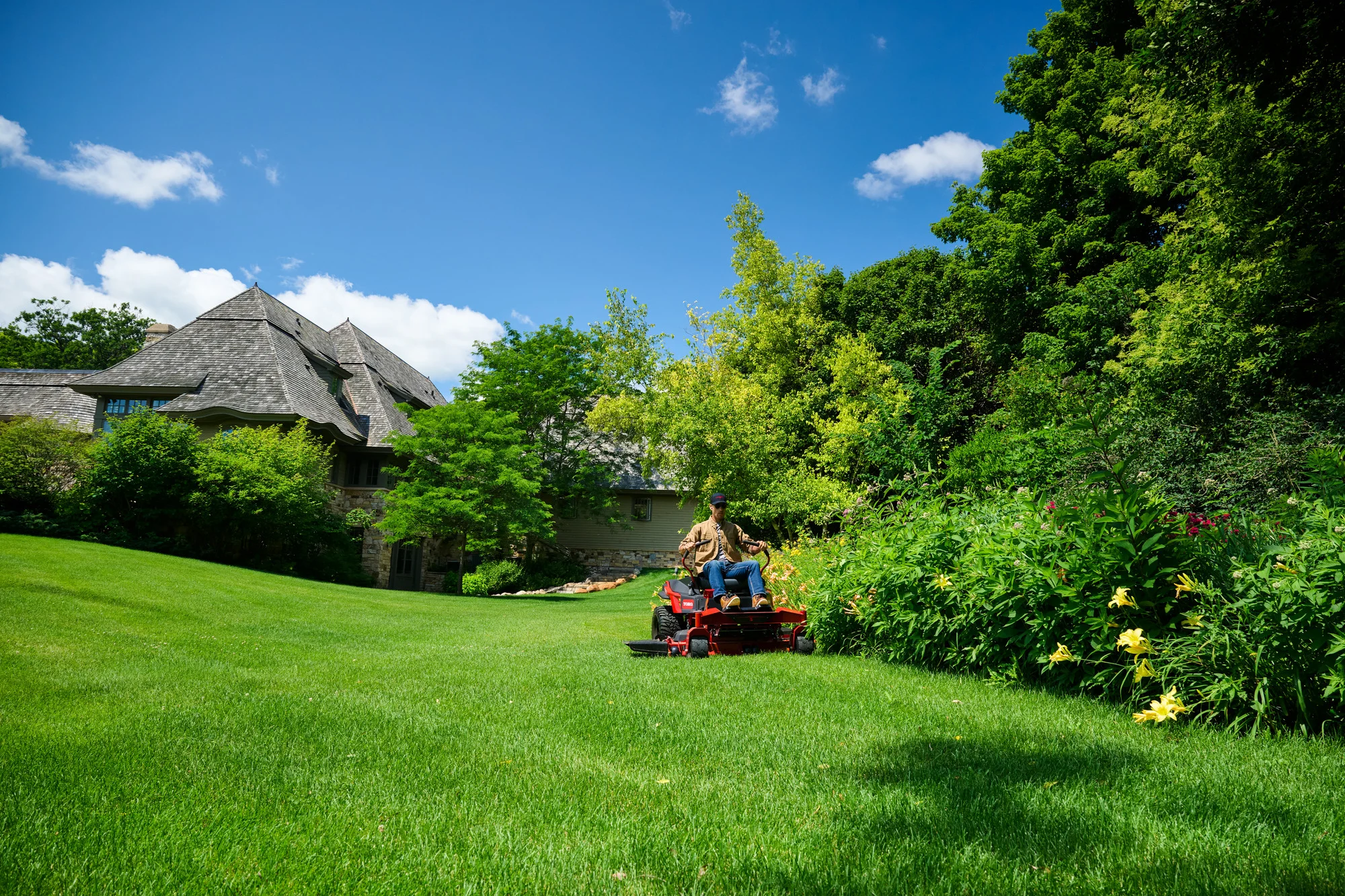 Toro Titan Series 76614 Man Mowing Brush House product image