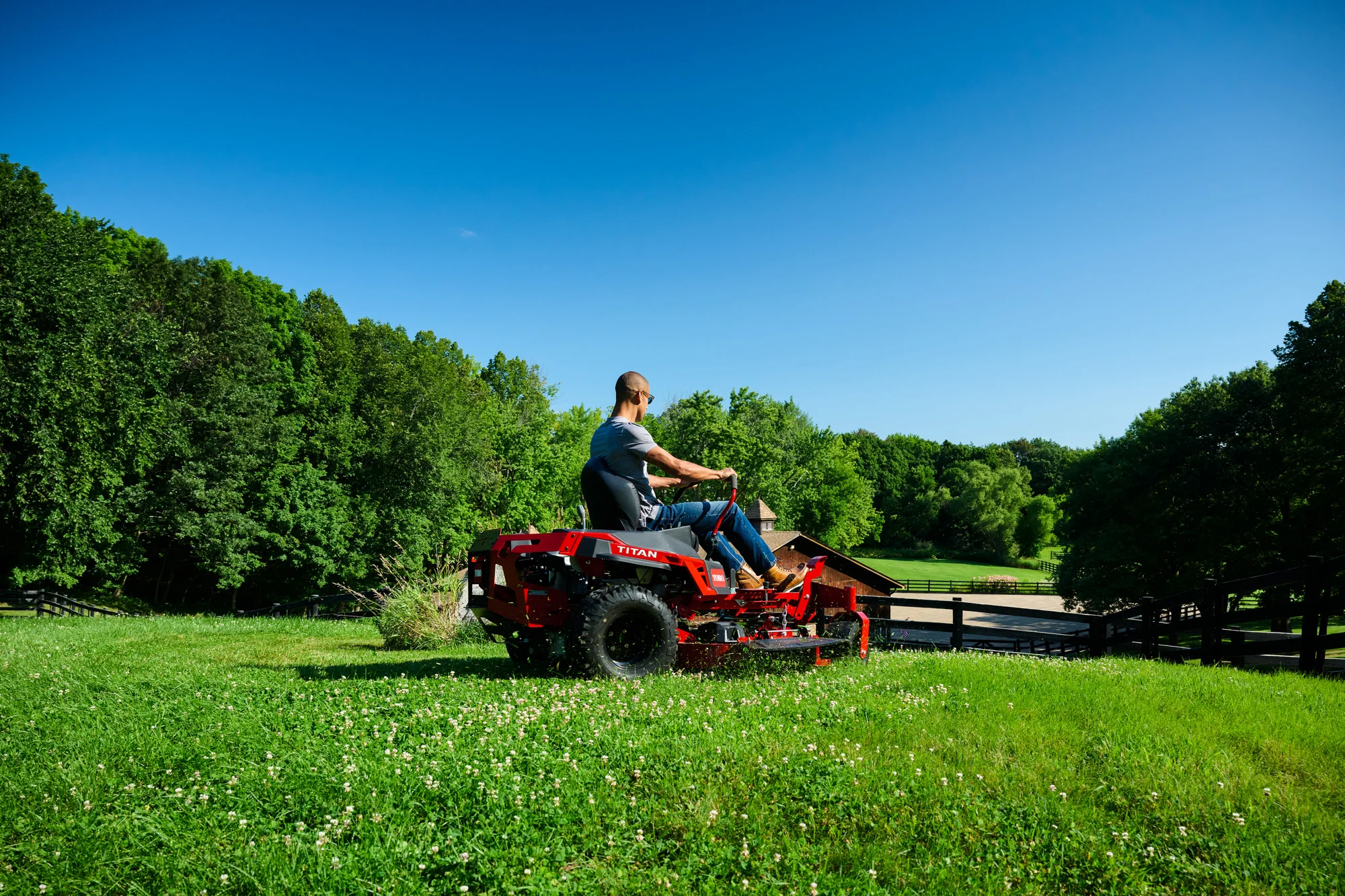Toro Titan Series 76614 Man Mowing Fence Back product image