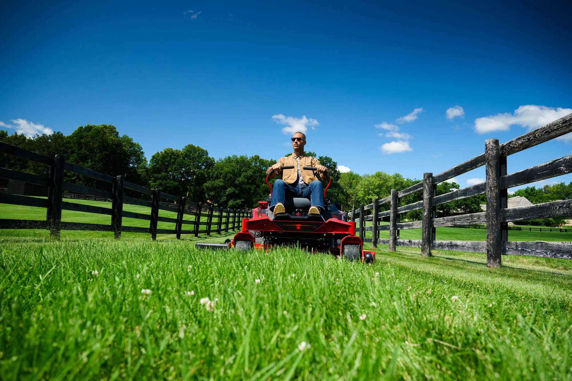 Toro Titan Series Zero Turn Rider 76614 Toro Titan Series 76614 Wide Angle Man Posing Mower Front product image