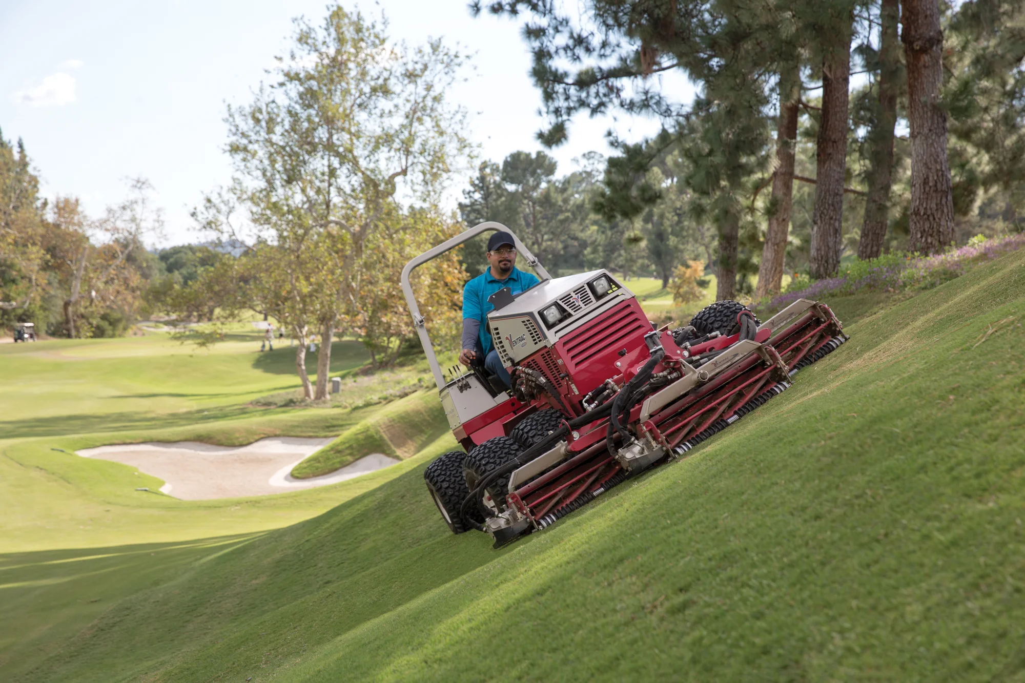 Ventrac P Series Compact Utility Tractors 4500P Front View Left Mowing Golf Course product image