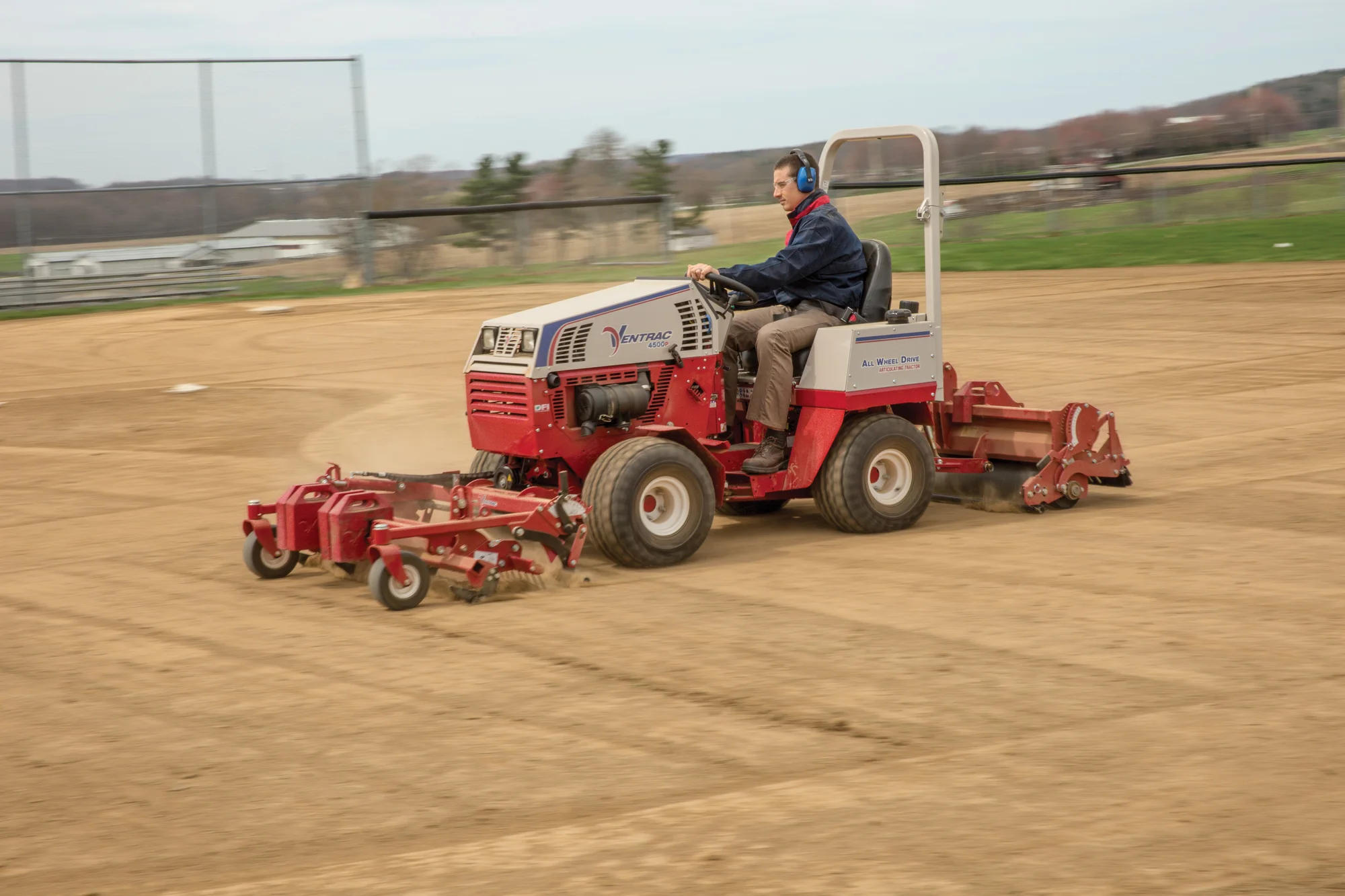 Ventrac P Series Compact Utility Tractors 4500P Front View Right Attachments In Use product image