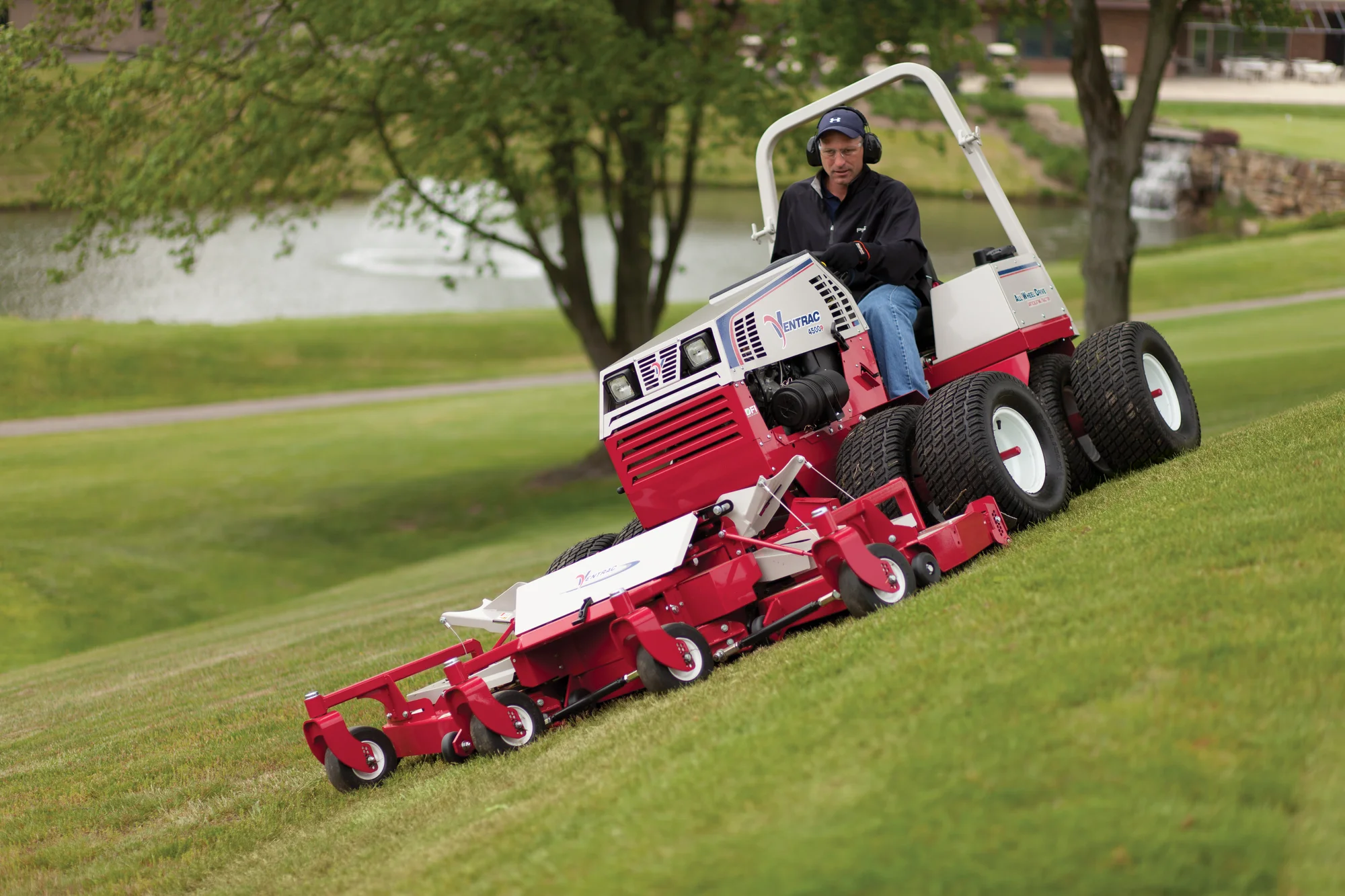 Ventrac P Series Compact Utility Tractors 4500P Front View Right Man Cutting Lawn product image