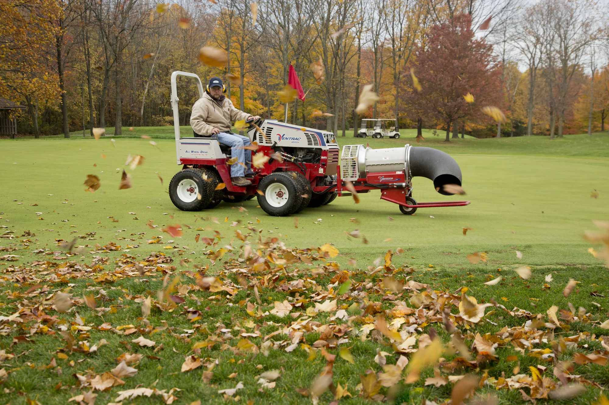 Used Ventrac 4500P All-Wheel Drive Articulating Tractor with 72 in Mower Deck TR5016FRTM Ventrac P Series Compact Utility Tractors 4500P Side View Left Leaf Blower Attachment product image