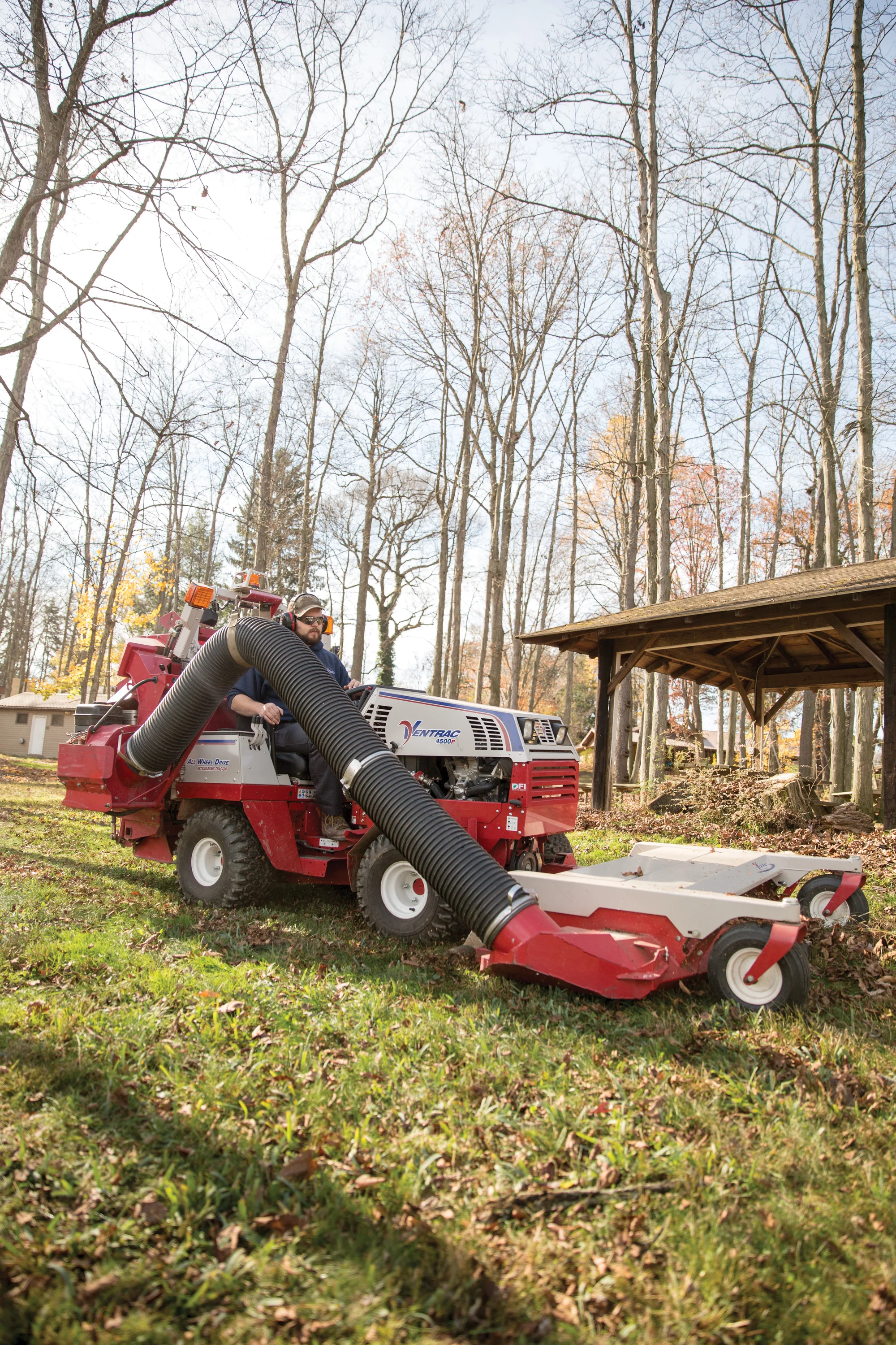 Ventrac P Series Compact Utility Tractors 4500P Side View Left Mowing And Vacuum product image