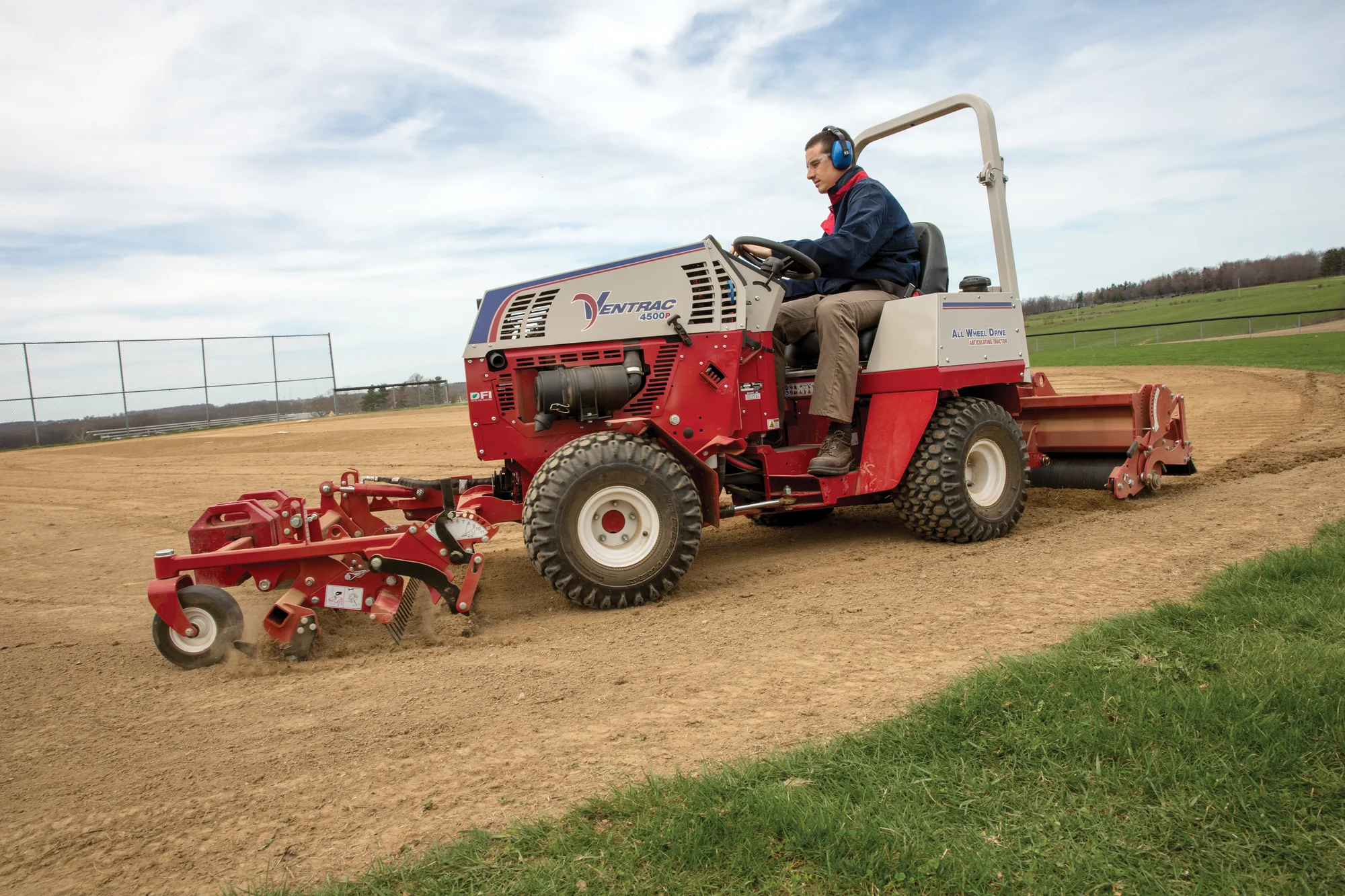 Ventrac P Series Compact Utility Tractors 4500P Side View Right Attachments In Use product image