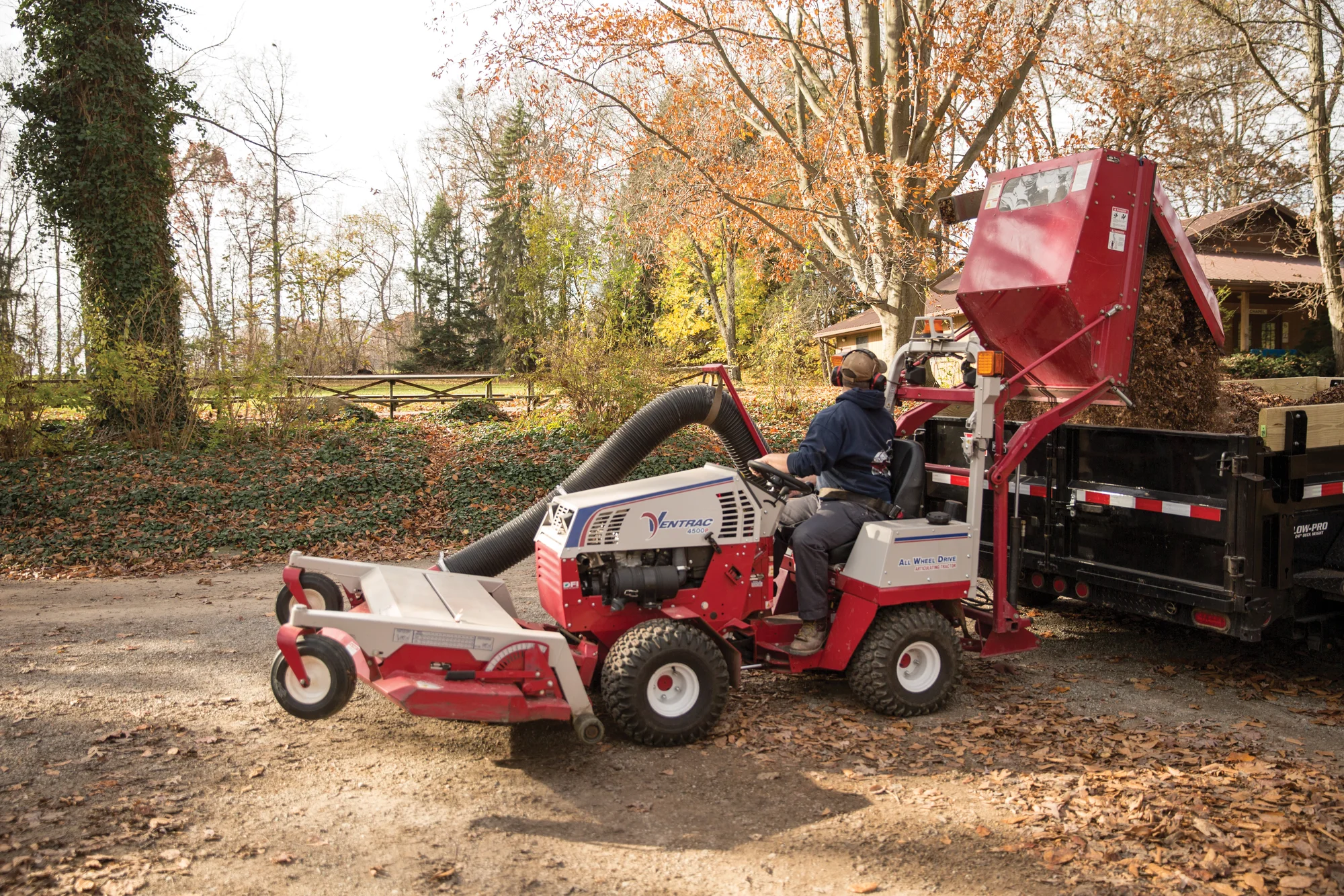 Used Ventrac 4500P All-Wheel Drive Articulating Tractor with 72 in Mower Deck TR5016FRTM Ventrac P Series Compact Utility Tractors 4500P Side View Right Leaf Vacuum Emptying product image