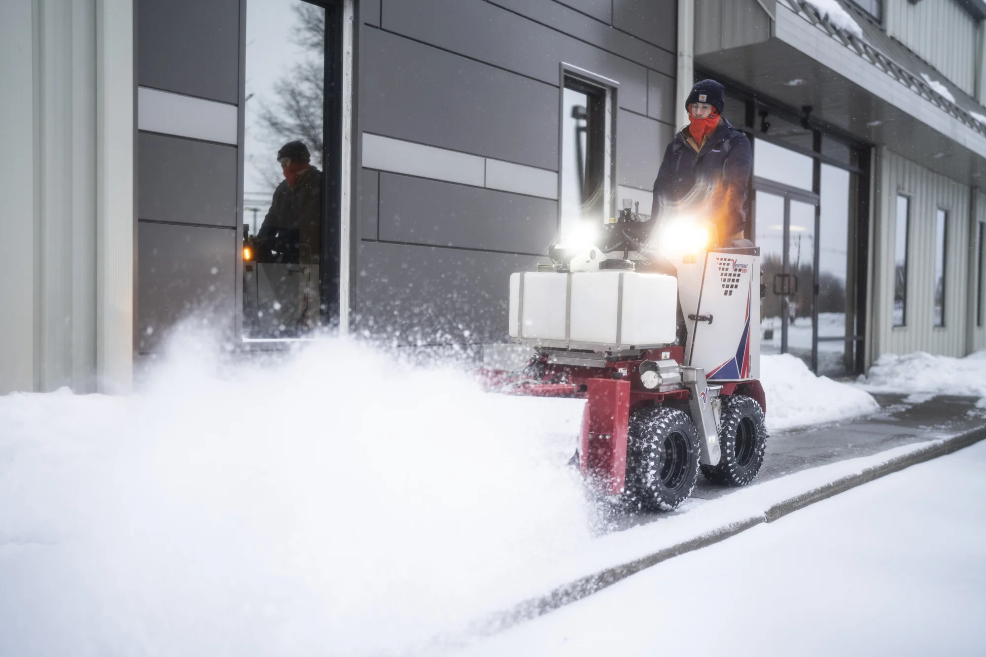 Ventrac Ssv Sidewalk Series Snow Vehicle 2120M Front View Left Clearing Snow Sidewalk product image