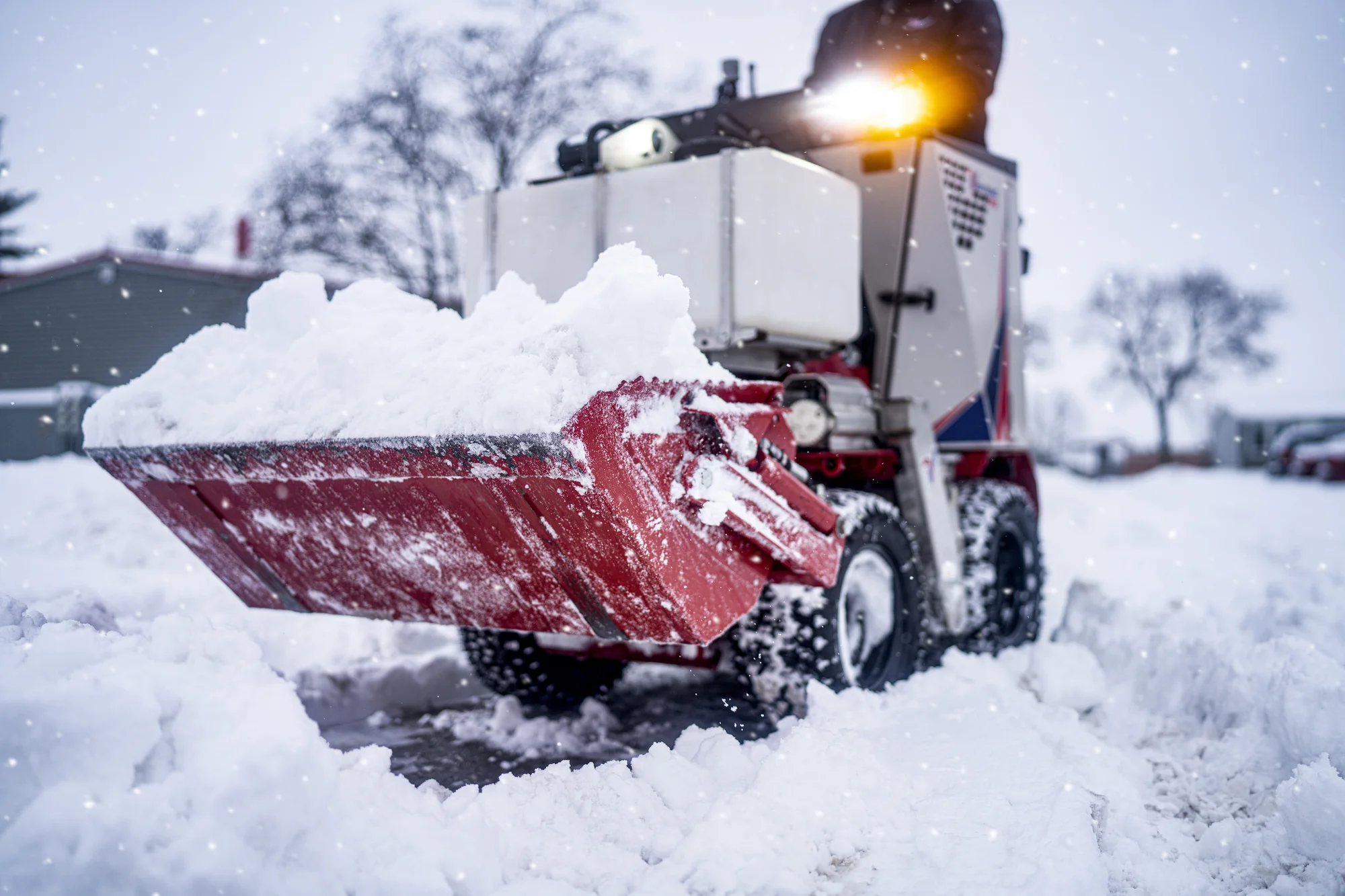 Ventrac Ssv Sidewalk Series Snow Vehicle 2120M Front View Left Closeup Clearing Snow product image