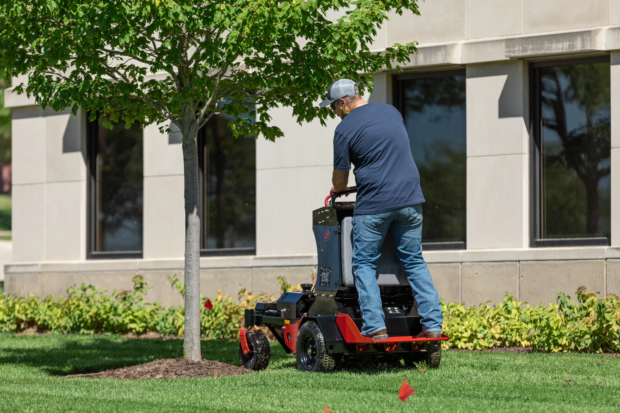 Z-Turf Z-Aerate 24 Stand-on Aerator ZA3624 Z Turf Z Aerate 24 Stand On Aerator Za3624 Back View Man Aerating Grass product image