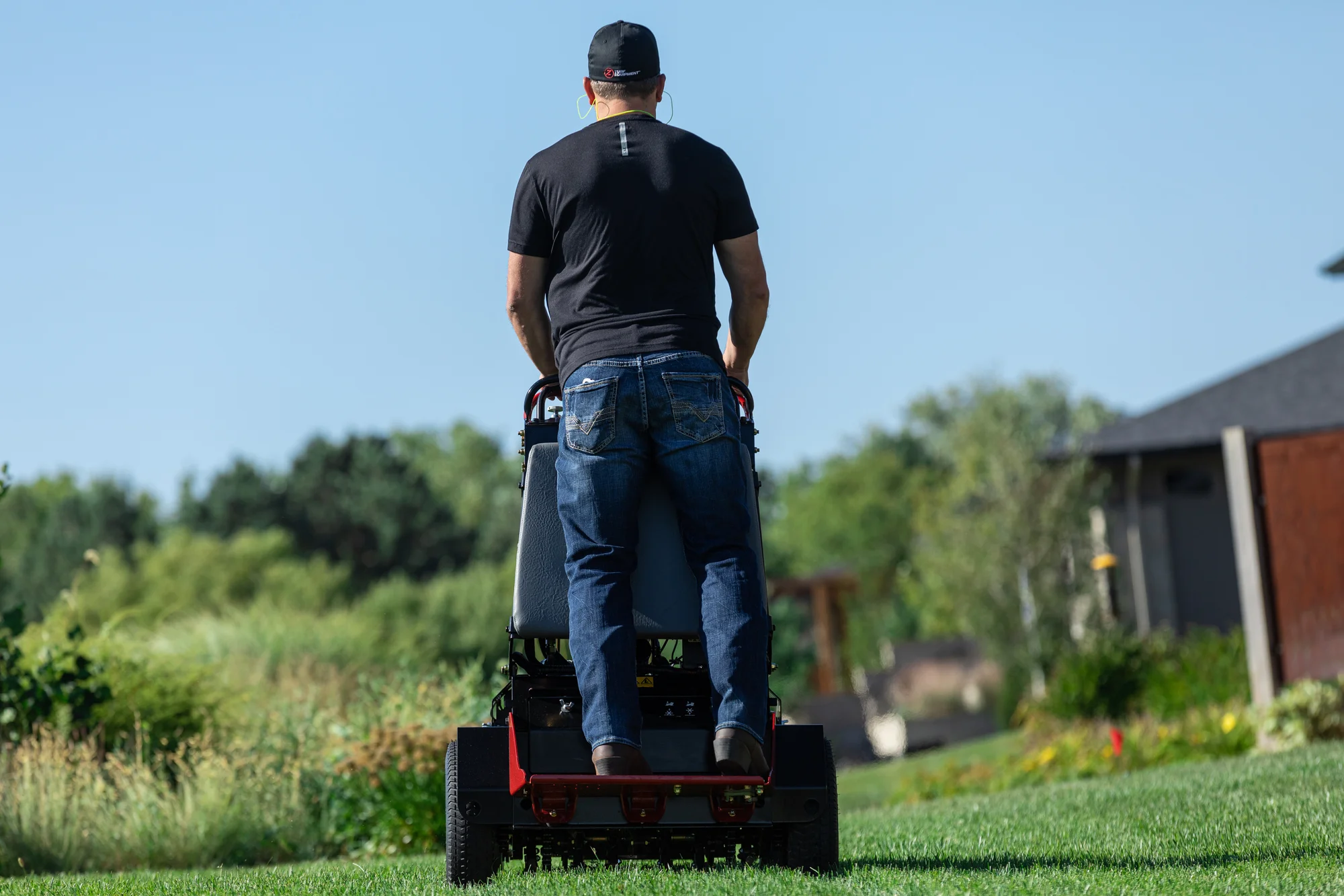 Z Turf Z Aerate 24 Stand On Aerator Za3624 Back View Man On Equipment product image
