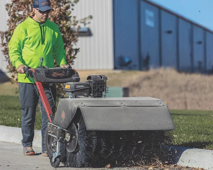 Z Turf Z Sweep Rotary Broom Zb4636 Man Cleaning Sidewalk product image